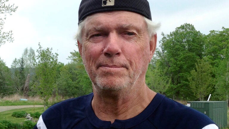 FILE - Former Boston Red Sox pitcher Bill "Spaceman" Lee poses May 25, 2016, at his home in Craftsbury, Vt.